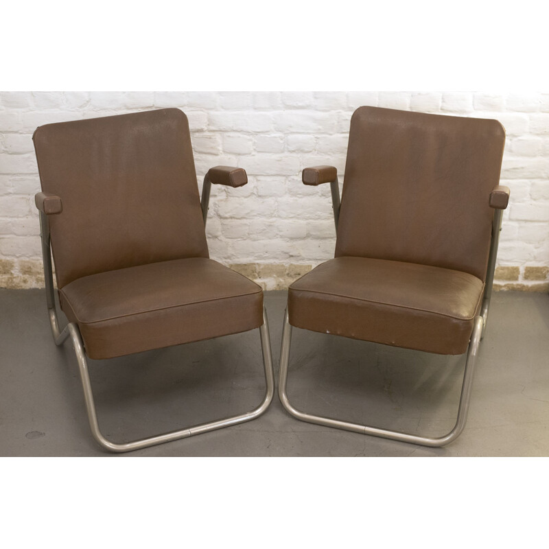 Pair of vintage tubular armchairs in skai and metal 1940