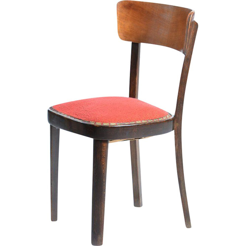 Chaise vintage rouge en bois