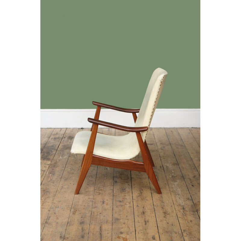 Vintage white high back armchair by Louis van Teeffelen