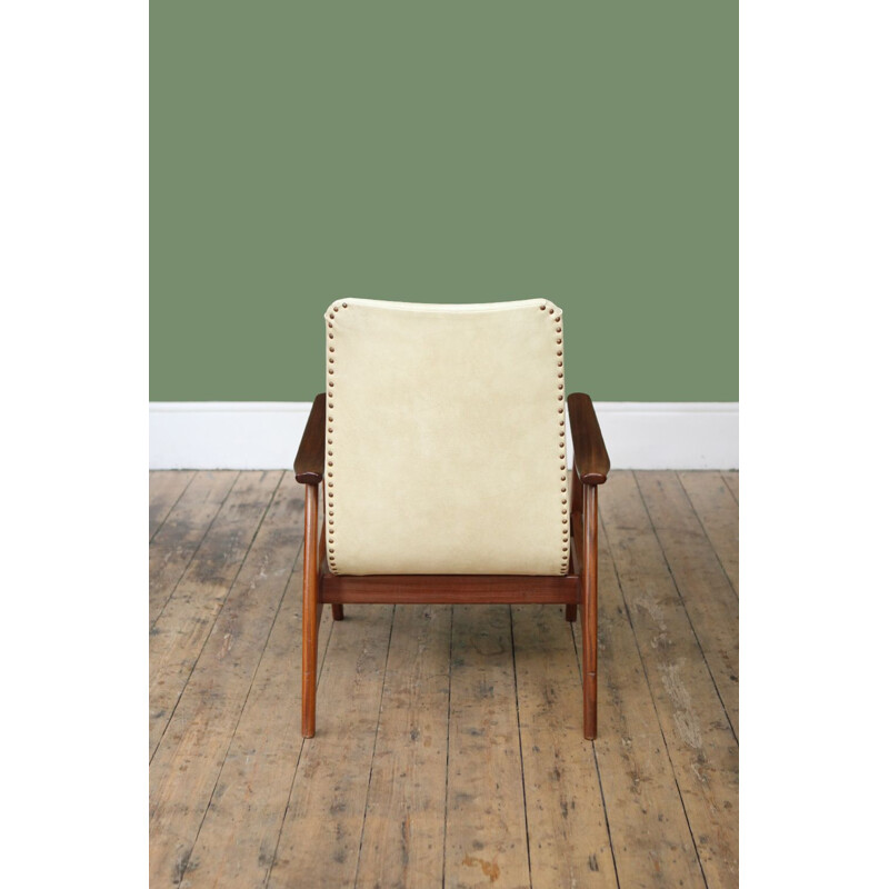 Vintage white high back armchair by Louis van Teeffelen