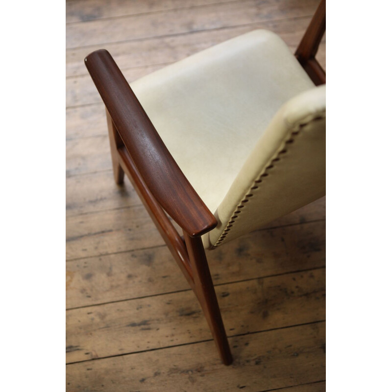 Vintage white high back armchair by Louis van Teeffelen