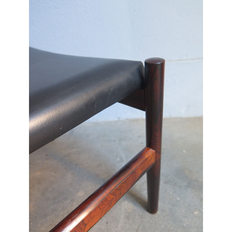 Vintage stool made of rosewood and faux black leather