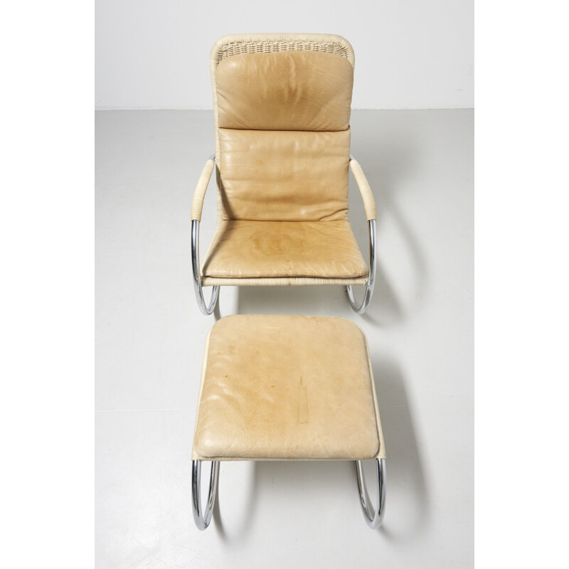 Vintage lounge chair with ottoman by Tecta