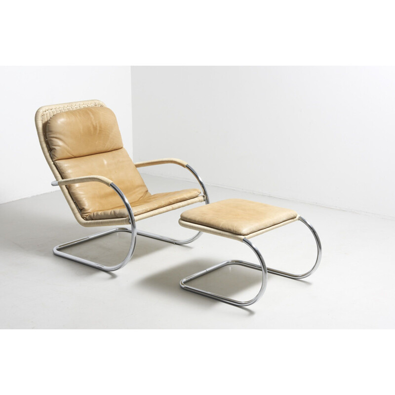 Vintage lounge chair with ottoman by Tecta