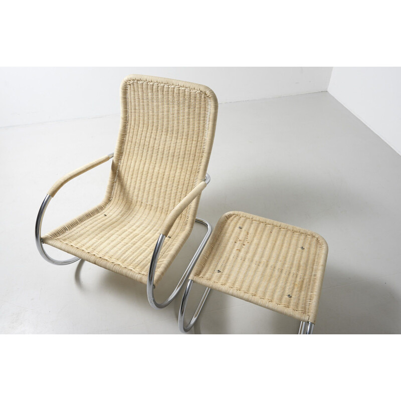 Vintage lounge chair with ottoman by Tecta