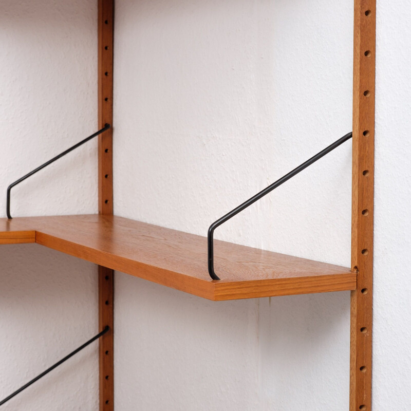 Vintage corner shelving system in teak