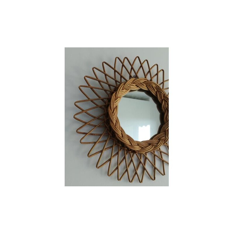 Vintage sun mirror in rattan