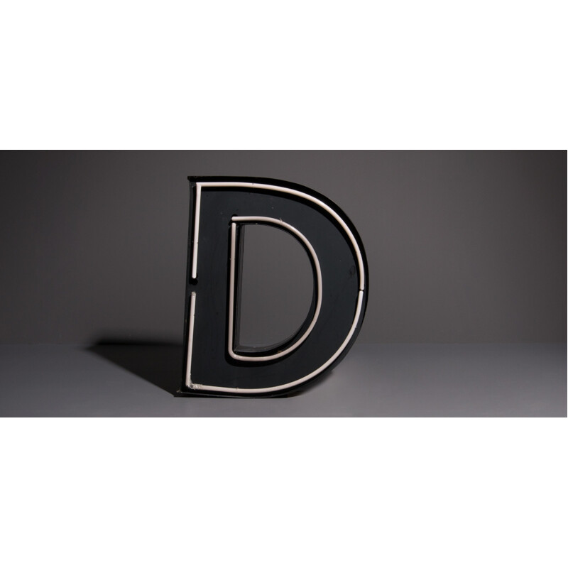 Vintage XL advertising letter D with neon lighting in metal and glass