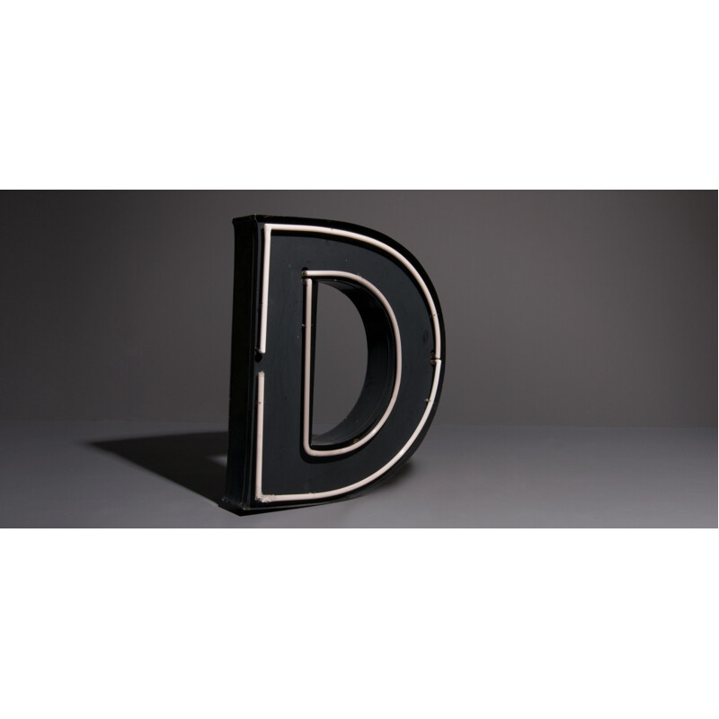 Vintage XL advertising letter D with neon lighting in metal and glass