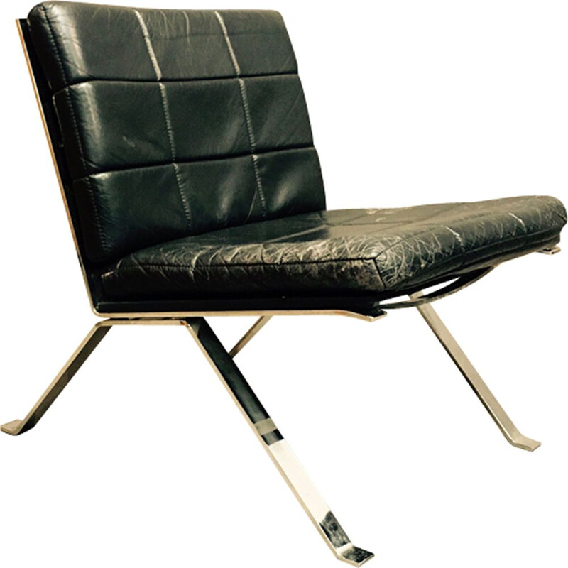 Vintage armchair in black leather by Hans Eichenberger