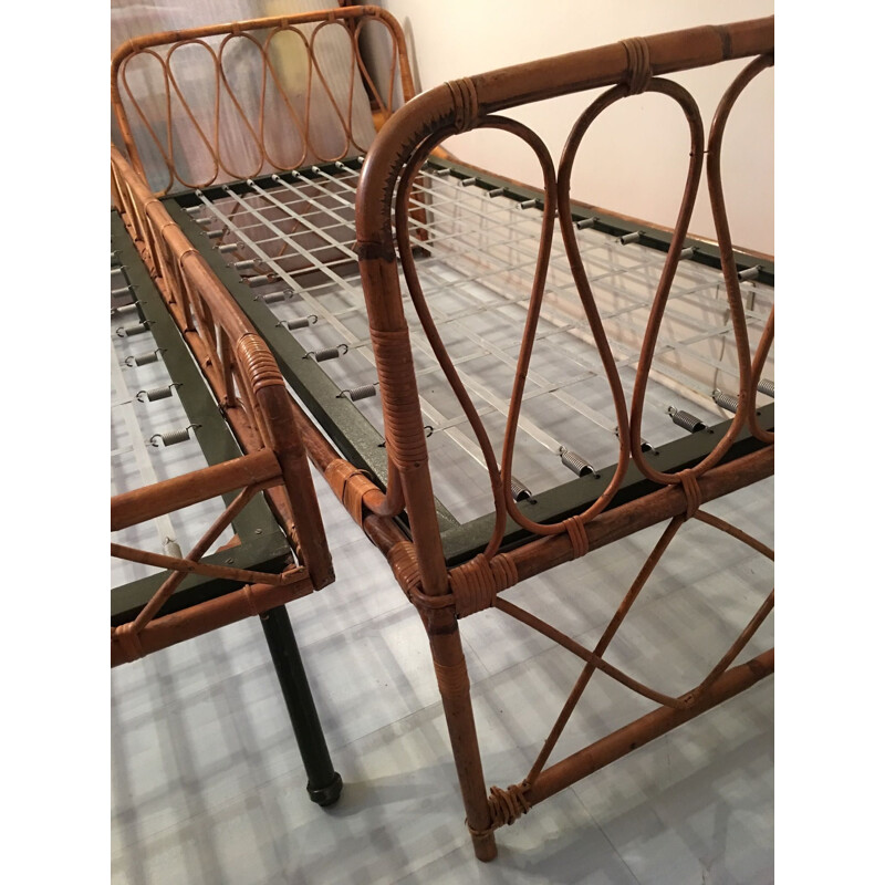 Vintage nesting bed in rattan