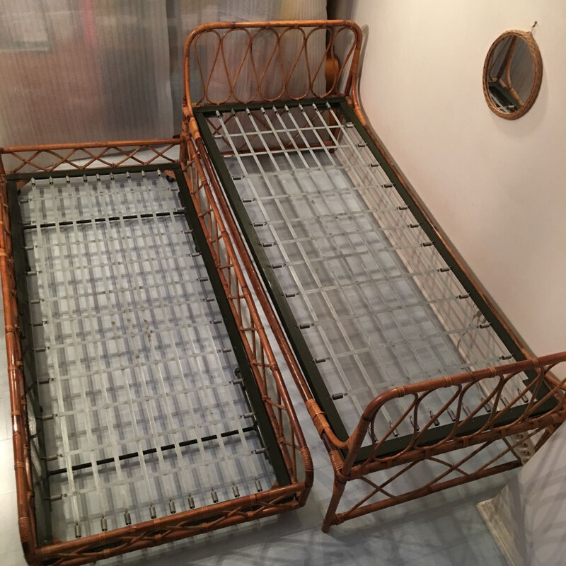 Vintage nesting bed in rattan