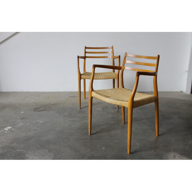 Set of 2 vintage chairs by N.O Møller for J.L. Mollers Møbelfabrik