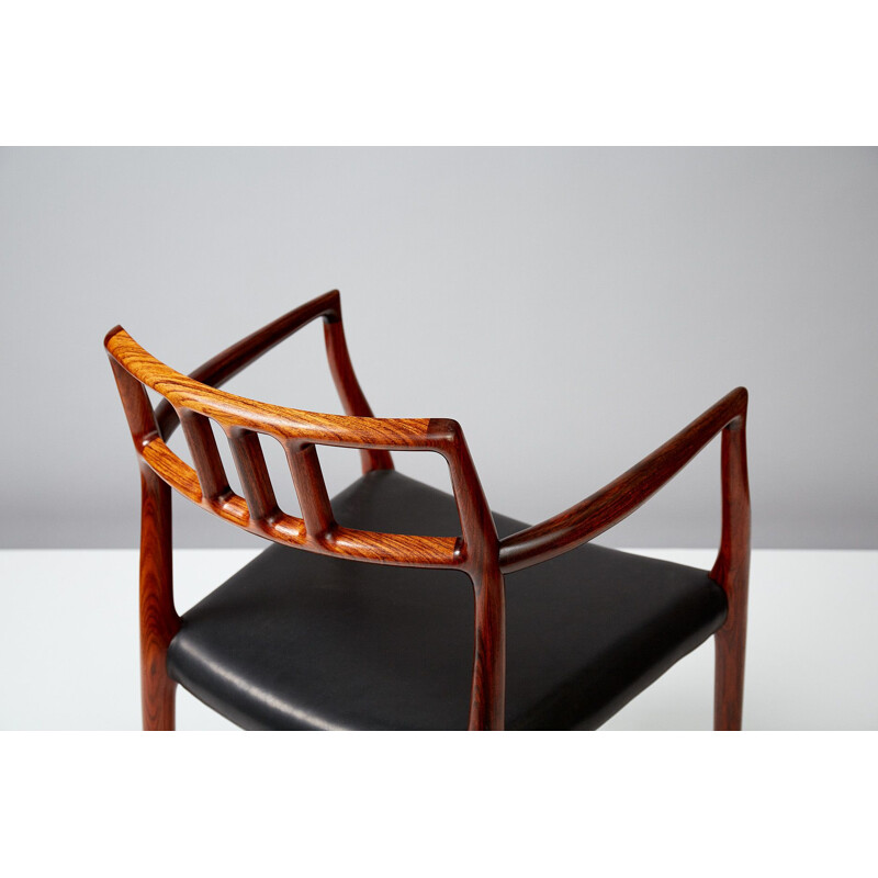 Vintage Danish armchair model 64 in rosewood by Niels Moller