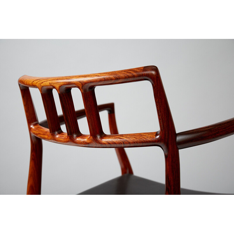 Vintage Danish armchair model 64 in rosewood by Niels Moller