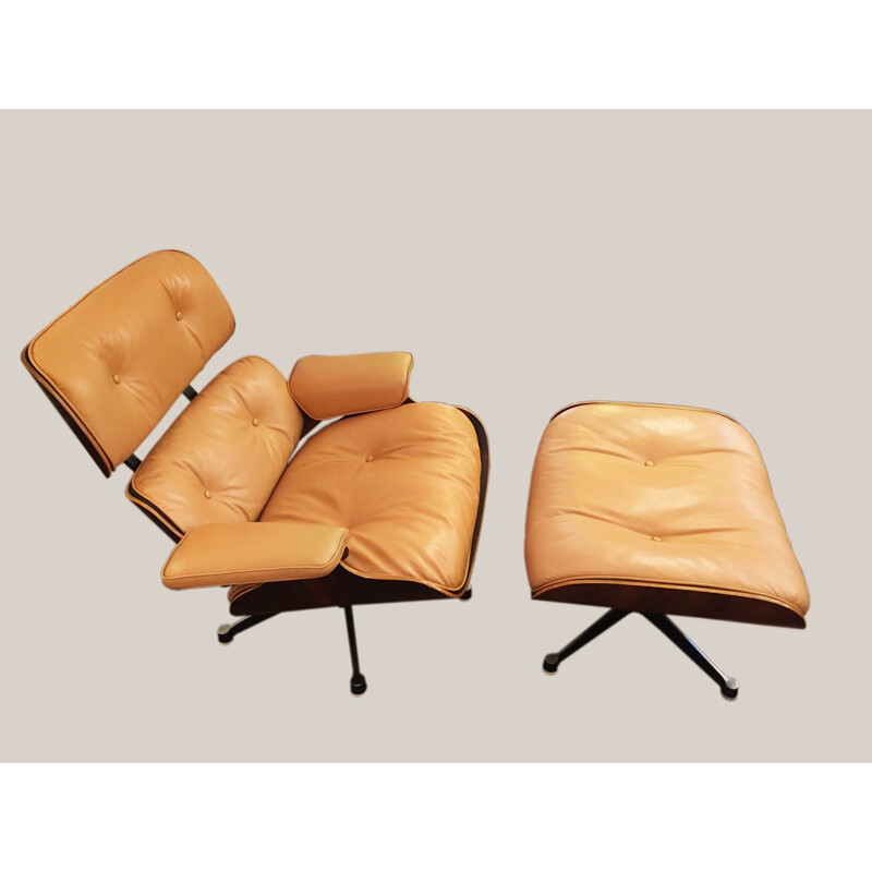 Lounge chair in rosewood and leather and its ottoman, Ray & Charles EAMES - 1977