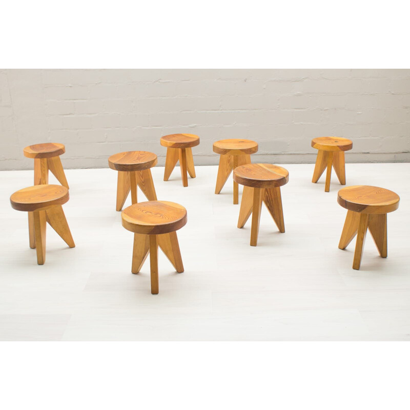 Set of 9 vintage 3 legged wooden stools from 1960s
