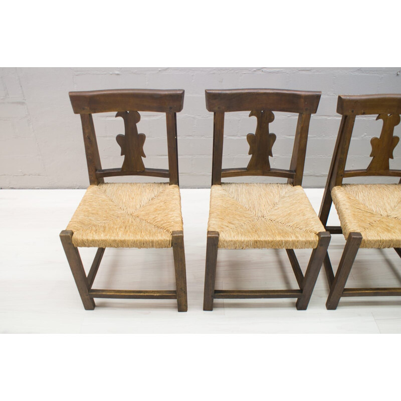 Set van 4 vintage houten en rotan stoelen