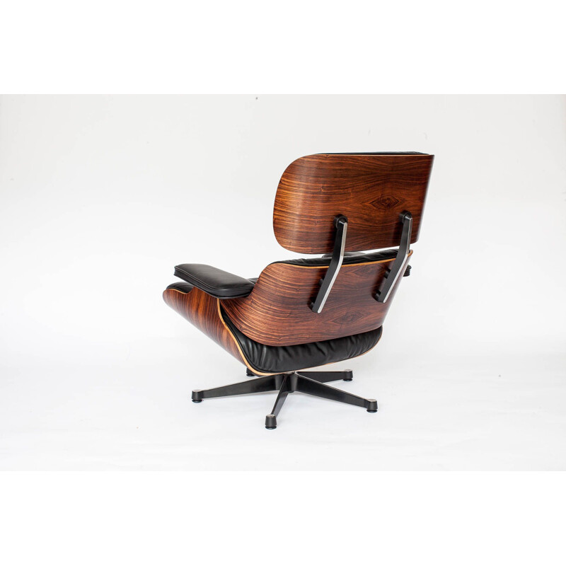 Vintage armchair in rosewood by Eames for Vitra