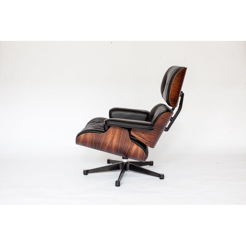 Vintage armchair in rosewood by Eames for Vitra