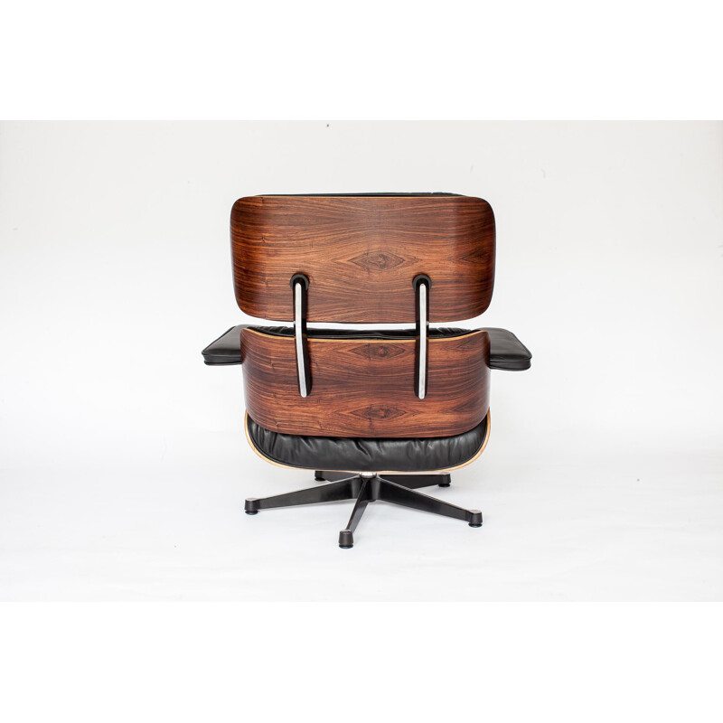 Vintage armchair in rosewood by Eames for Vitra