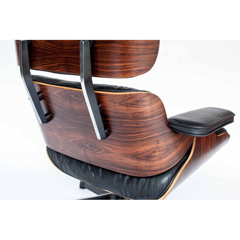 Vintage armchair in rosewood by Eames for Vitra