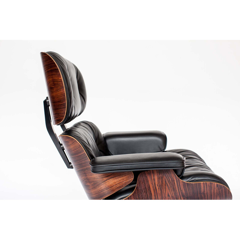 Vintage armchair in rosewood by Eames for Vitra
