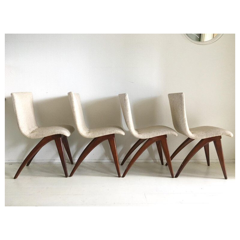 Set van 4 vintage witte stoelen model Swing van CJ van Os Culemborg