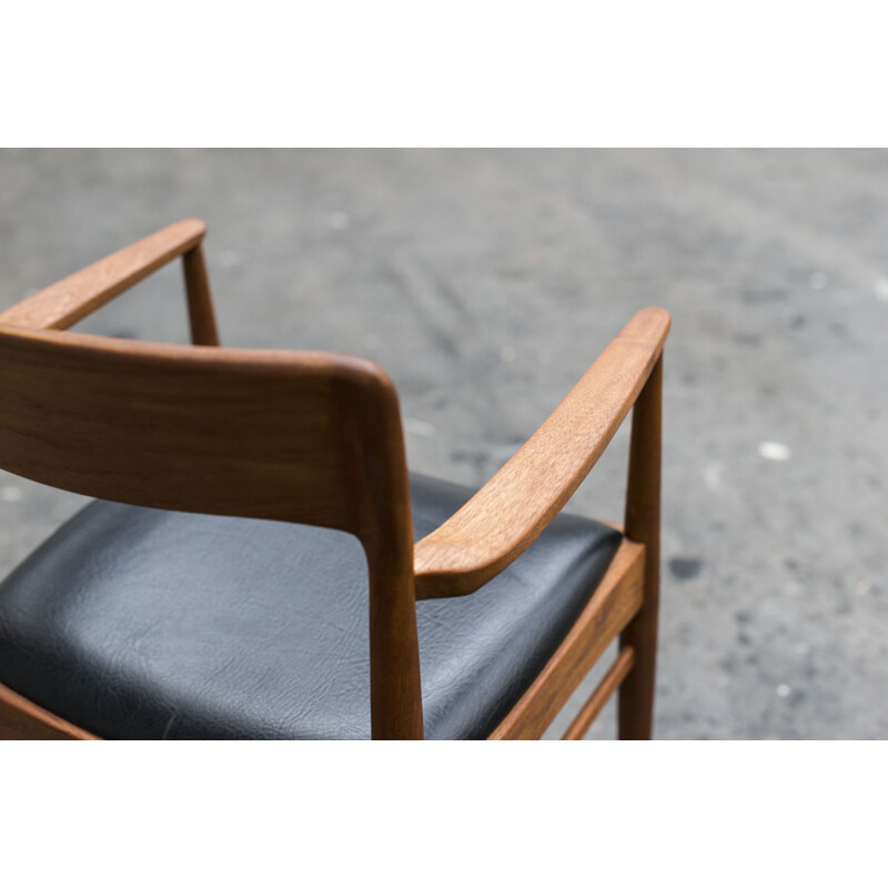Vintage black chair by henning Kjaernulf