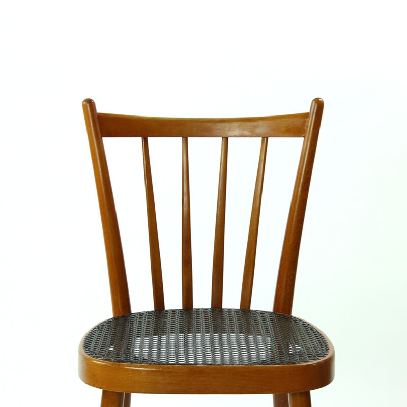 Dining chair with black plastic wicker by Ton