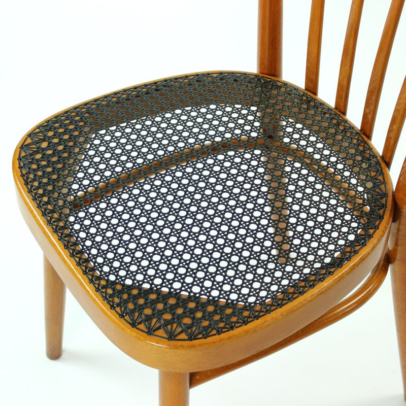 Dining chair with black plastic wicker by Ton