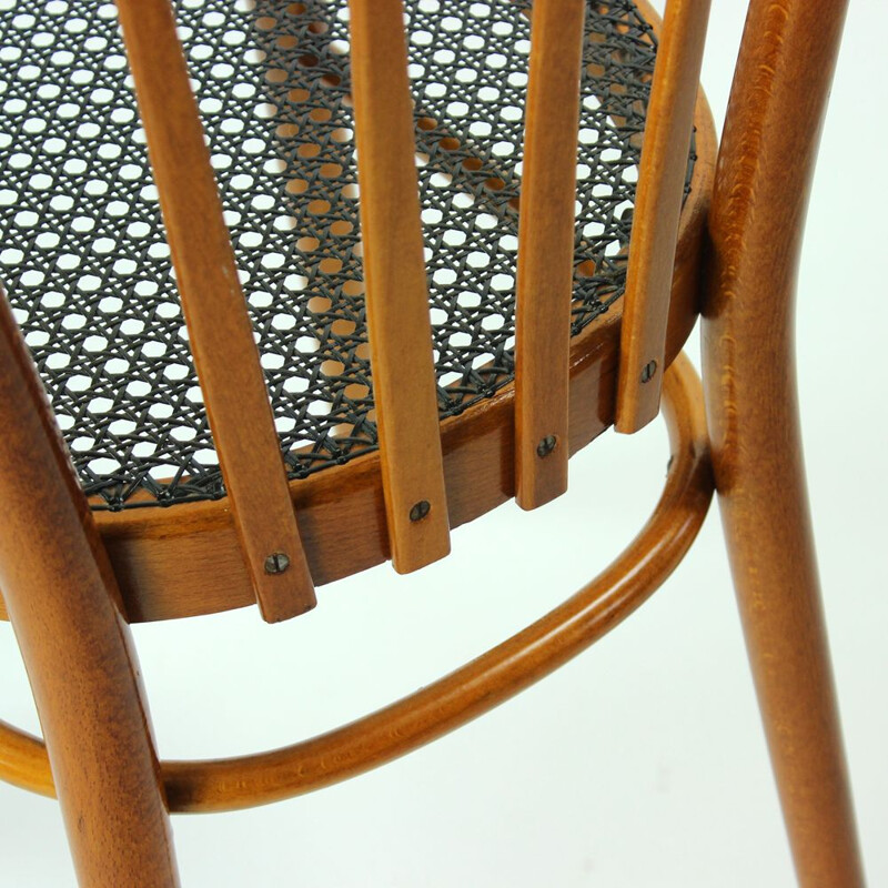 Dining chair with black plastic wicker by Ton