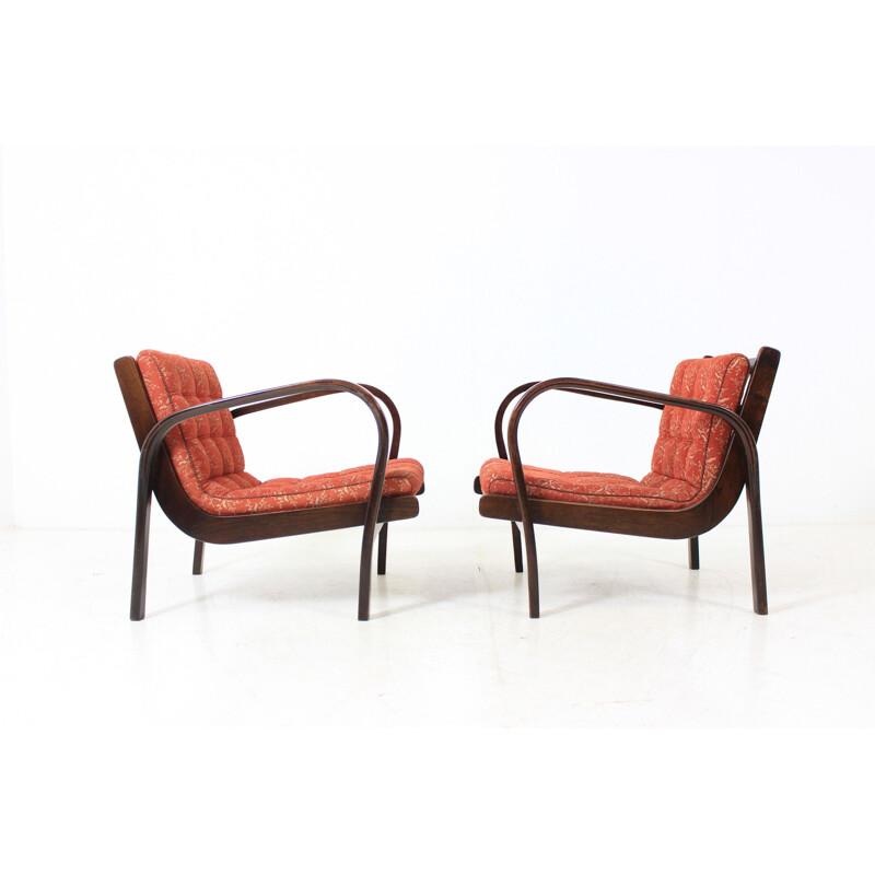 Set of 2 vintage red armchairs by Kozelka and Kropáček