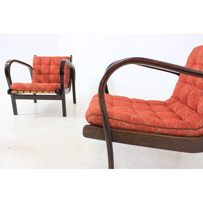 Set of 2 vintage red armchairs by Kozelka and Kropáček