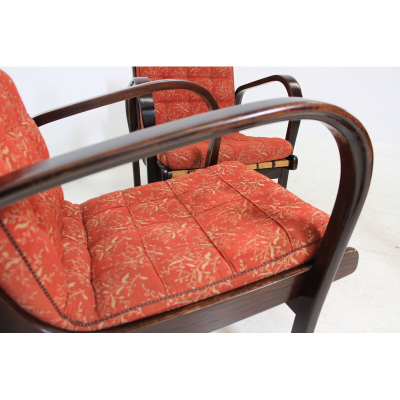 Set of 2 vintage red armchairs by Kozelka and Kropáček