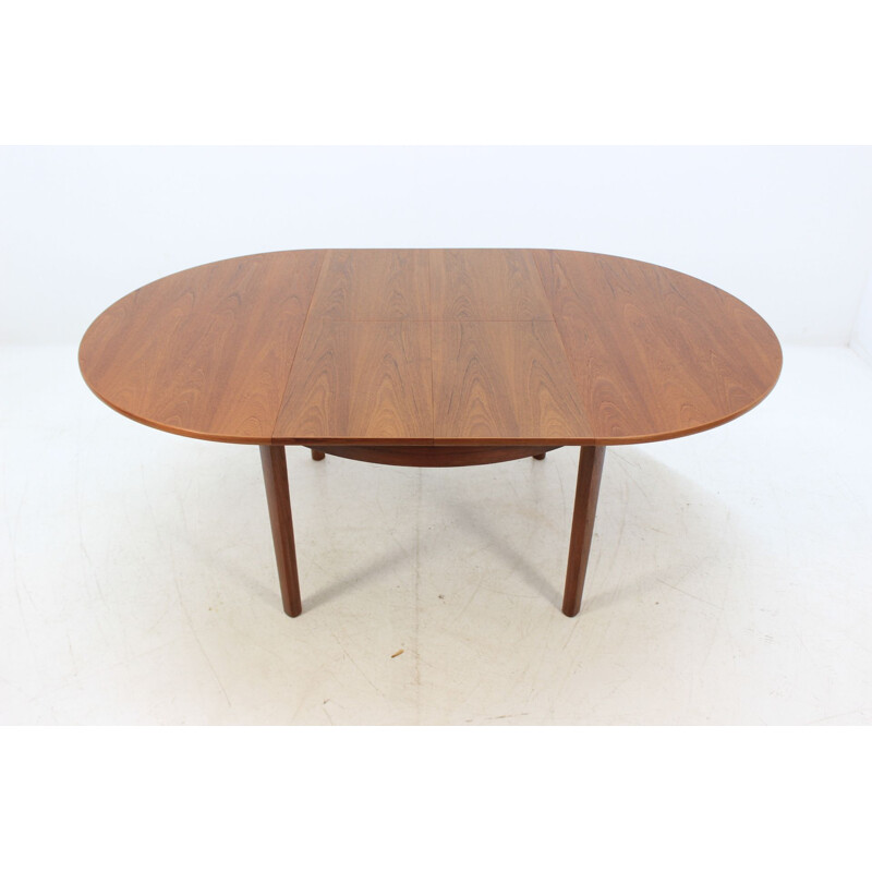 Vintage extendable dining table in teak