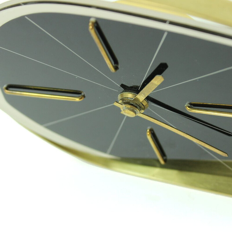 Vintage black clock in brass and plastic by Prim