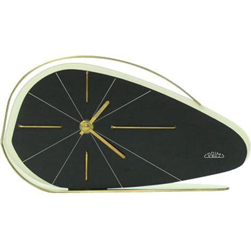 Vintage black clock in brass and plastic by Prim