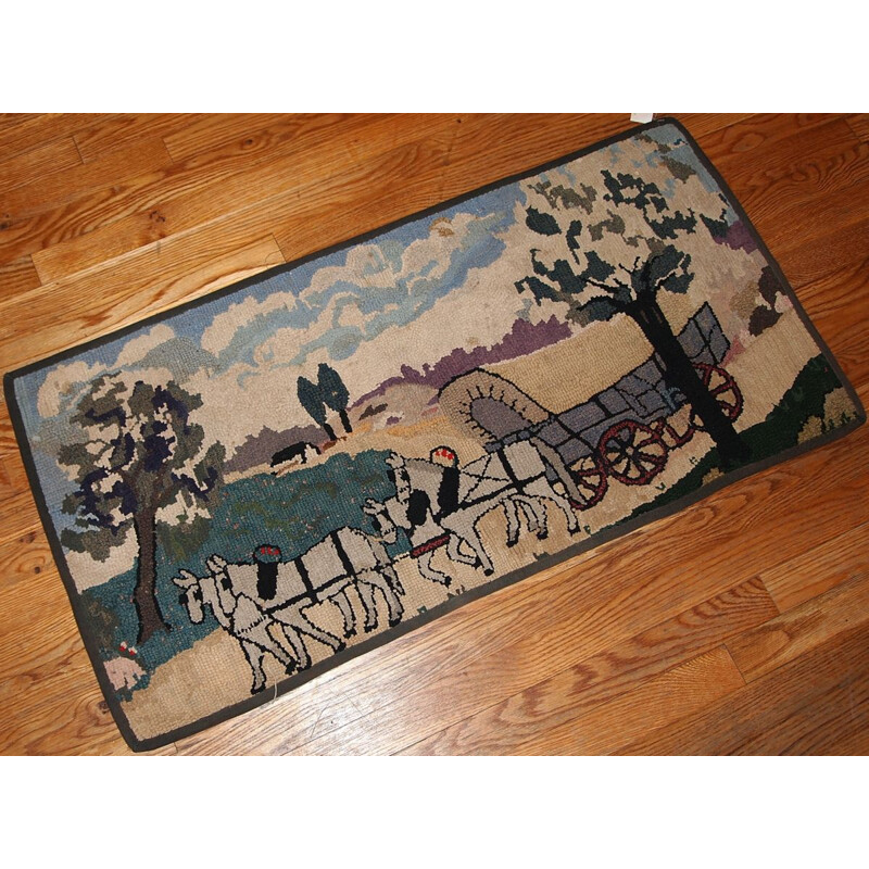 Vintage handmade american hooked rug in beige wool