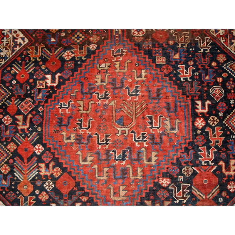 Tapis vintage perse Khamseh fabrication artisanale en laine rouge 1930 
