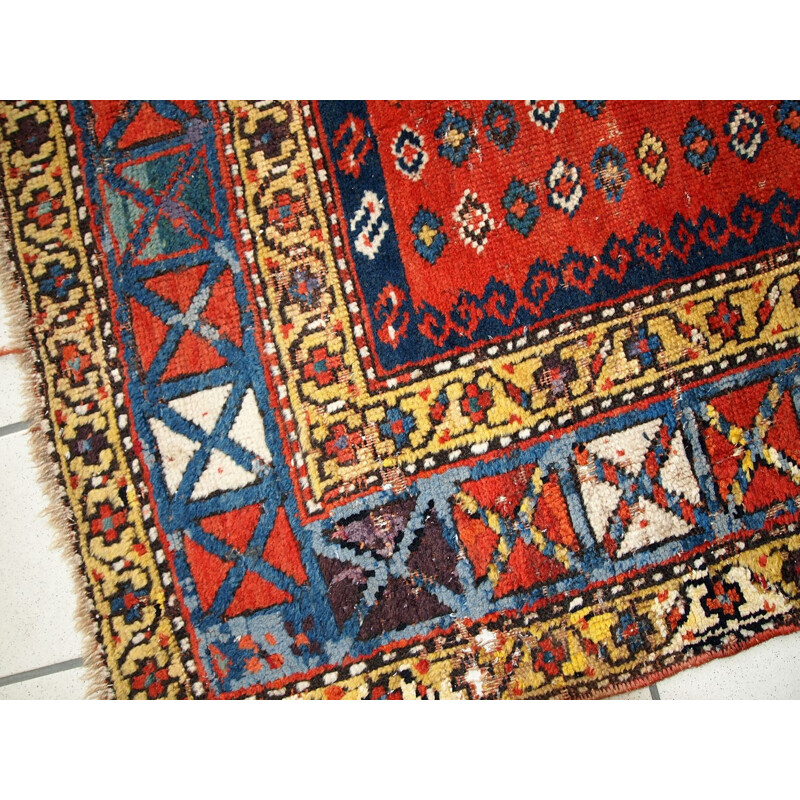 Vintage handmade russian Kazak rug red blue and yellow tones