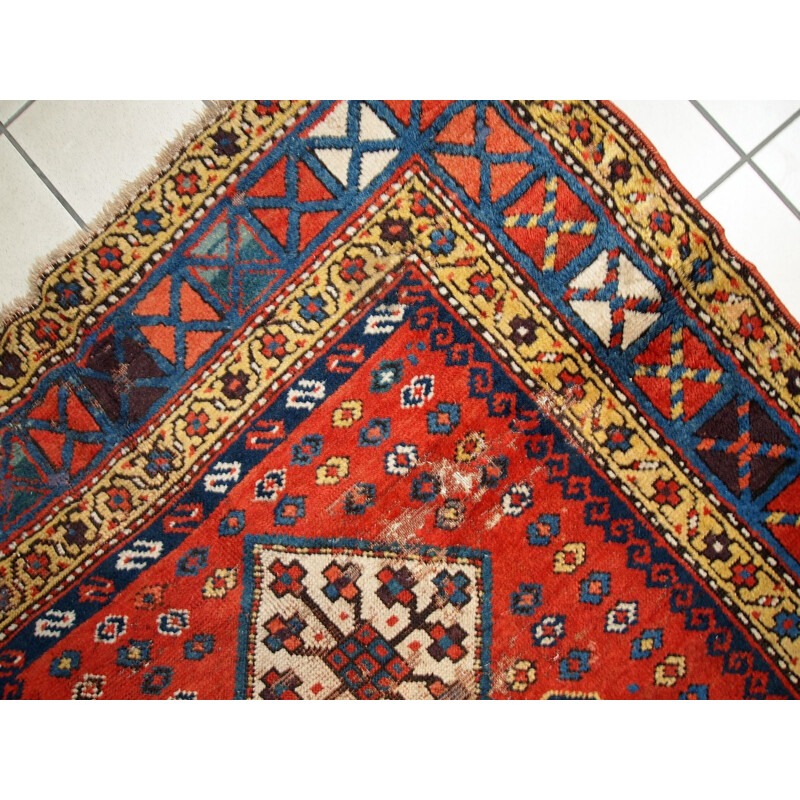 Vintage handmade russian Kazak rug red blue and yellow tones