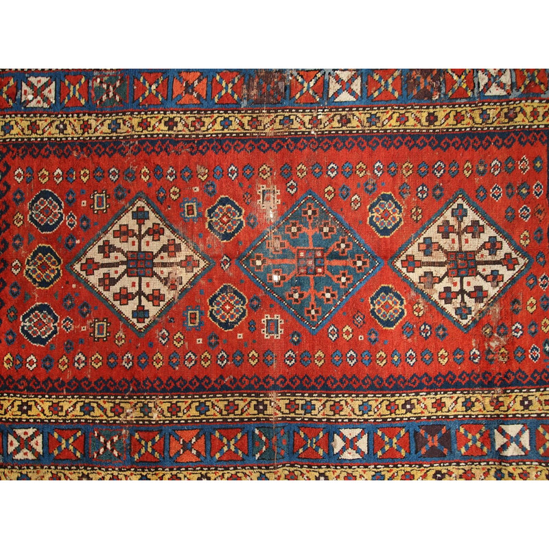 Tapis vintage artisanal Kazak Caucase tons rouge bleu et jaune