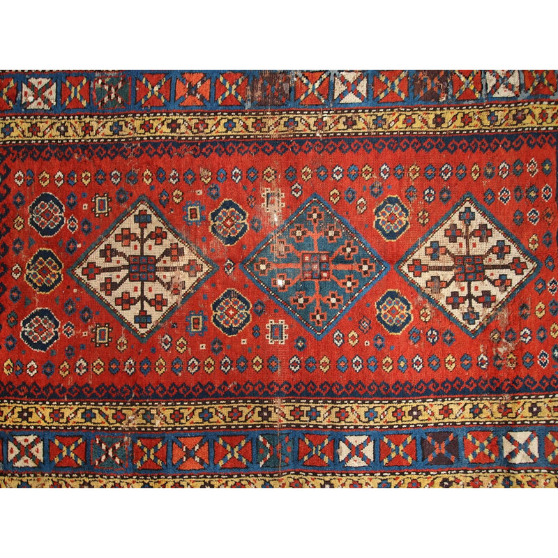 Vintage handmade russian Kazak rug red blue and yellow tones