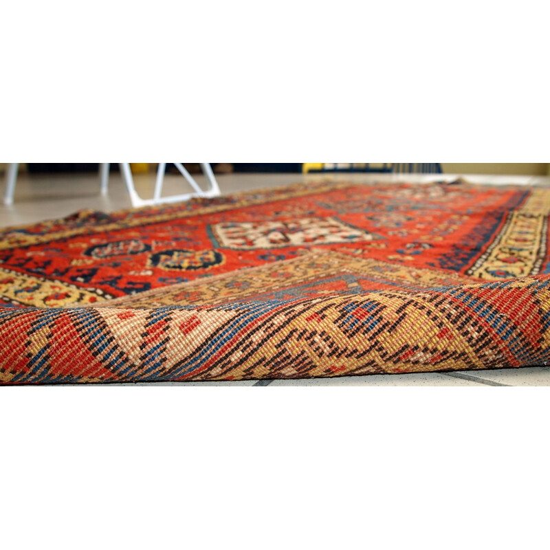 Tapis vintage artisanal Kazak Caucase tons rouge bleu et jaune