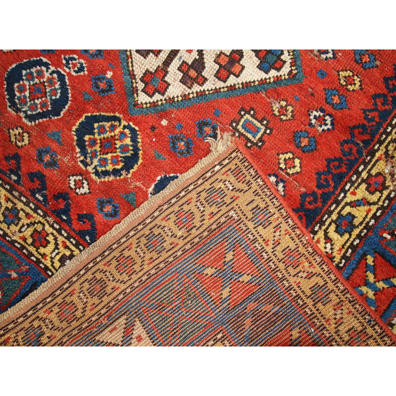 Tapis vintage artisanal Kazak Caucase tons rouge bleu et jaune