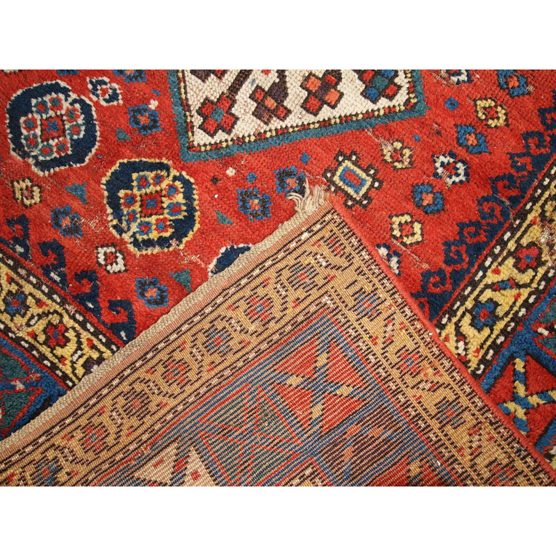 Vintage handmade russian Kazak rug red blue and yellow tones