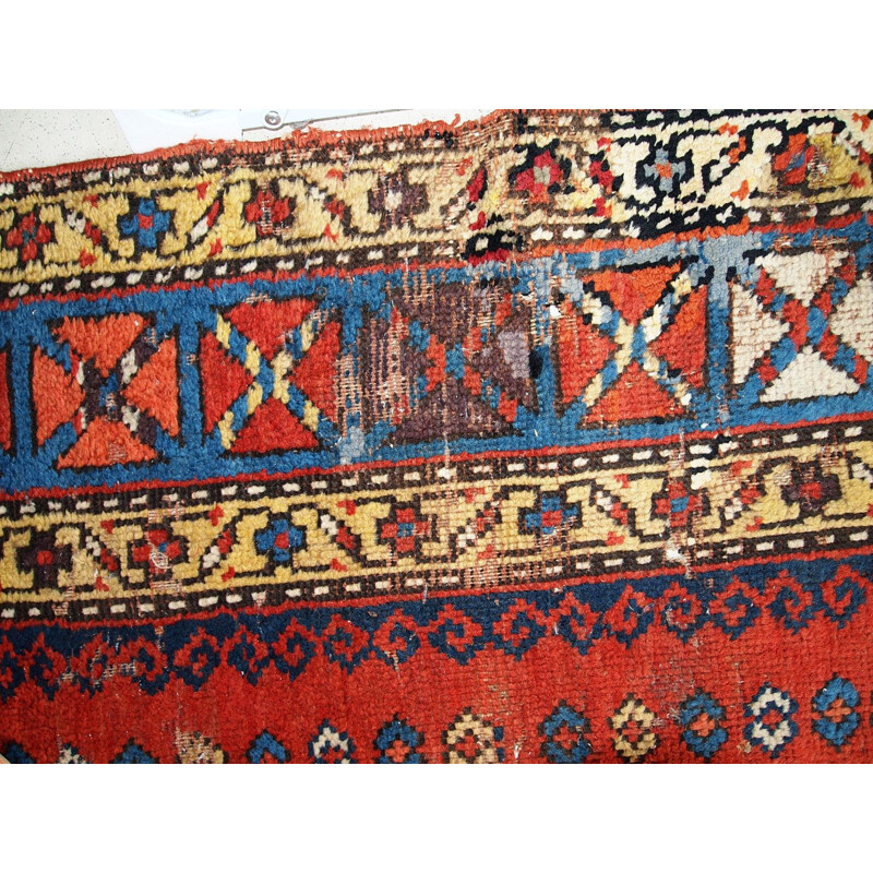 Tapis vintage artisanal Kazak Caucase tons rouge bleu et jaune