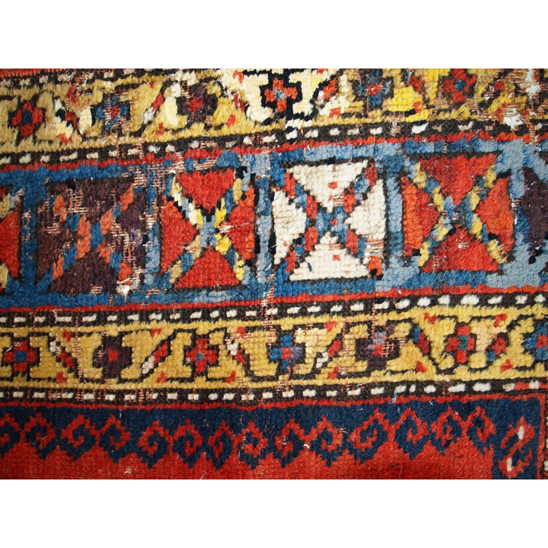 Vintage handmade russian Kazak rug red blue and yellow tones