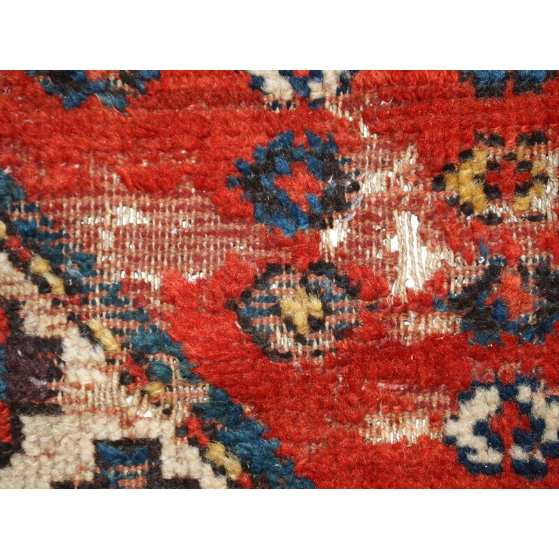 Vintage handmade russian Kazak rug red blue and yellow tones